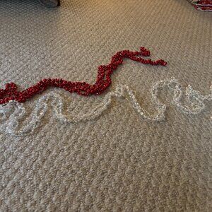 Red and white double bead strands for Christmas decoration.